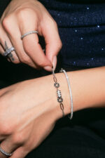 Silver hand cuff with zircon stones